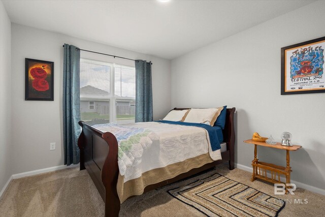 20567 Mercury Dr, Robertsdale, AL 36567 - bedroom with carpet flooring and baseboards
