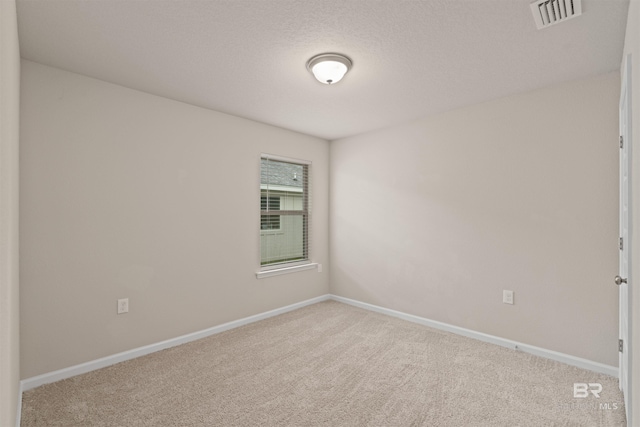 unfurnished room with carpet floors