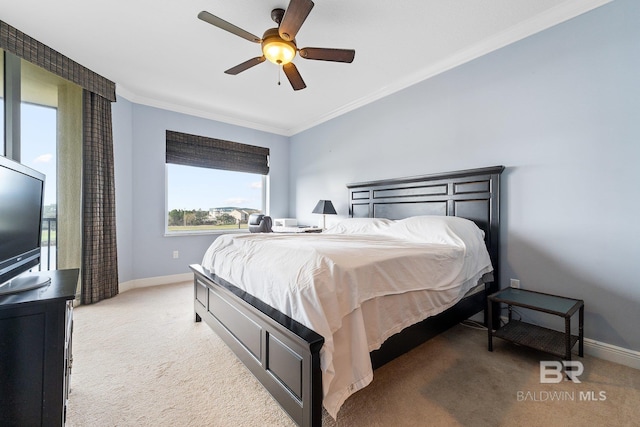 carpeted bedroom with crown molding and ceiling fan