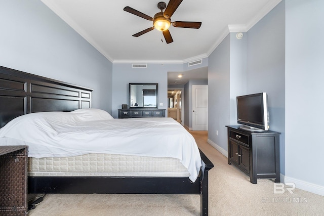 carpeted bedroom with ceiling fan and ornamental molding