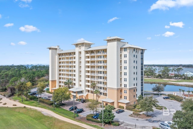 view of building exterior with a water view