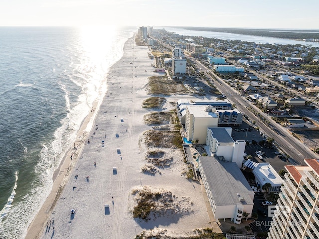 aerial view featuring a water view and a beach view