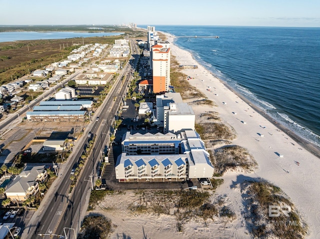 aerial view featuring a water view and a beach view