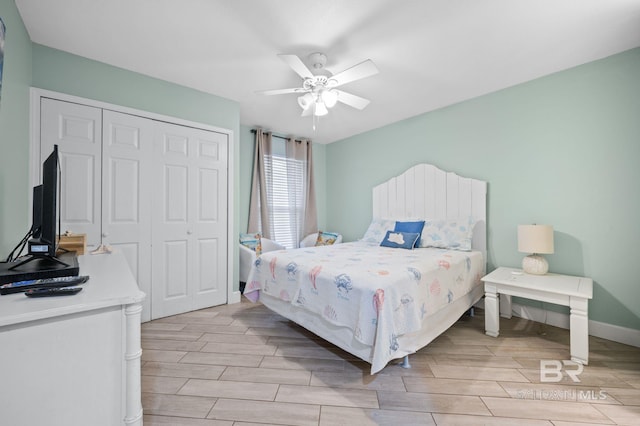 bedroom featuring a closet, ceiling fan, and light hardwood / wood-style floors