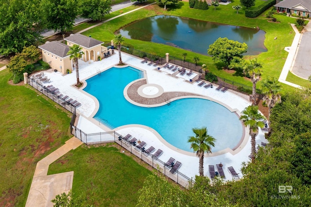 view of swimming pool featuring a water view