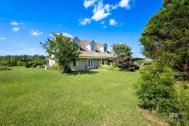 48851 Colt Run, Bay Minette, AL 36507 - view of grassy yard featuring a carport