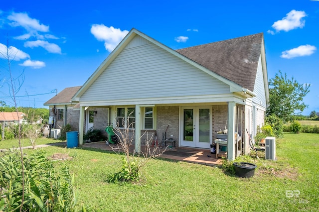 48851 Colt Run, Bay Minette, AL 36507 - back of house with a yard, french doors, brick siding, and roof with shingles
