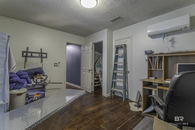 48851 Colt Run, Bay Minette, AL 36507 - office space with a wall mounted AC, wood-type flooring, a textured ceiling, and baseboards