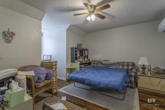 48851 Colt Run, Bay Minette, AL 36507 - bedroom featuring wood finished floors, a ceiling fan, a textured ceiling, and vaulted ceiling