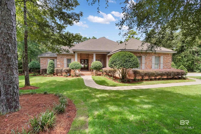 single story home with a front yard