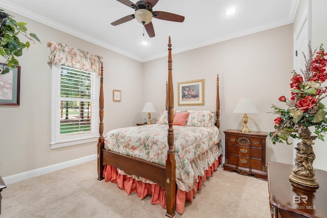 bedroom featuring ornamental molding, ceiling fan, and light colored carpet