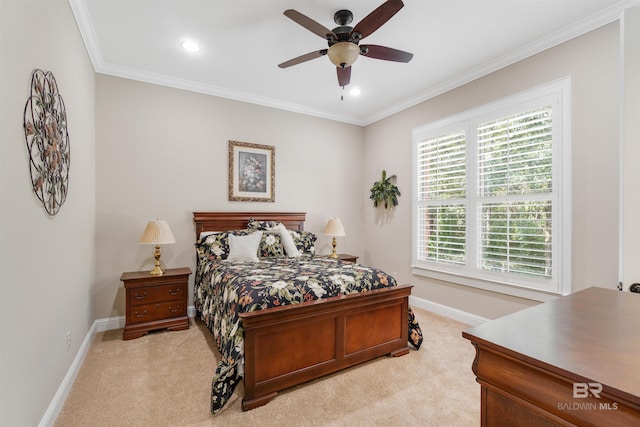 bedroom with ceiling fan, ornamental molding, and light carpet