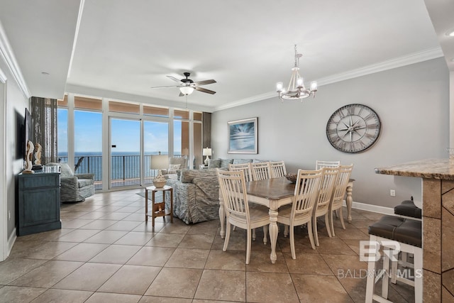 25494 Perdido Beach Blvd Unit 2005, Orange Beach, AL 36561 - tiled dining area featuring crown molding, baseboards, floor to ceiling windows, and ceiling fan with notable chandelier