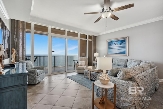 25494 Perdido Beach Blvd Unit 2005, Orange Beach, AL 36561 - living room featuring tile patterned floors, ceiling fan, ornamental molding, and a water view