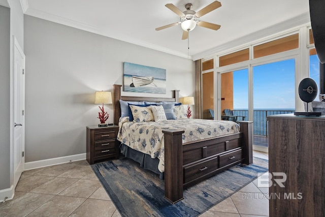 25494 Perdido Beach Blvd Unit 2005, Orange Beach, AL 36561 - bedroom with baseboards, ornamental molding, tile patterned floors, and access to exterior