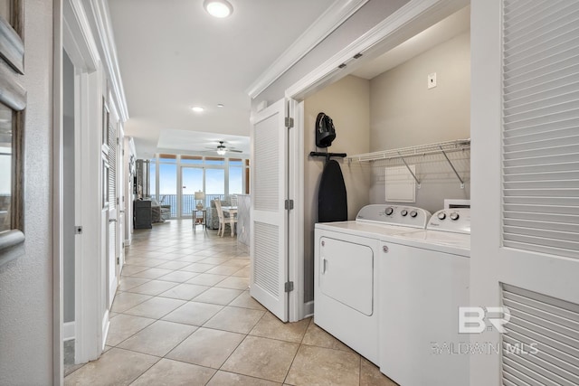 25494 Perdido Beach Blvd Unit 2005, Orange Beach, AL 36561 - clothes washing area featuring independent washer and dryer, laundry area, ceiling fan, recessed lighting, and light tile patterned floors