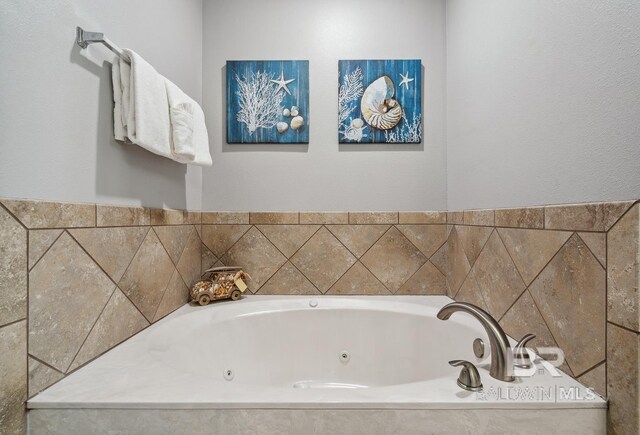 25494 Perdido Beach Blvd Unit 2005, Orange Beach, AL 36561 - bathroom featuring a jetted tub