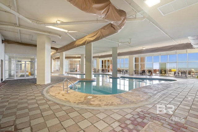 25494 Perdido Beach Blvd Unit 2005, Orange Beach, AL 36561 - community pool featuring french doors and a patio area