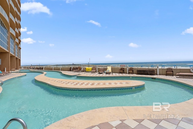 25494 Perdido Beach Blvd Unit 2005, Orange Beach, AL 36561 - pool with a water view and fence