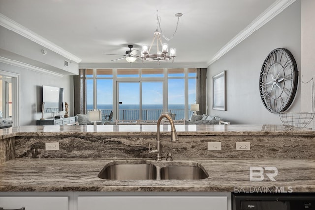 25494 Perdido Beach Blvd Unit 2005, Orange Beach, AL 36561 - kitchen featuring a sink, ornamental molding, stone countertops, and open floor plan