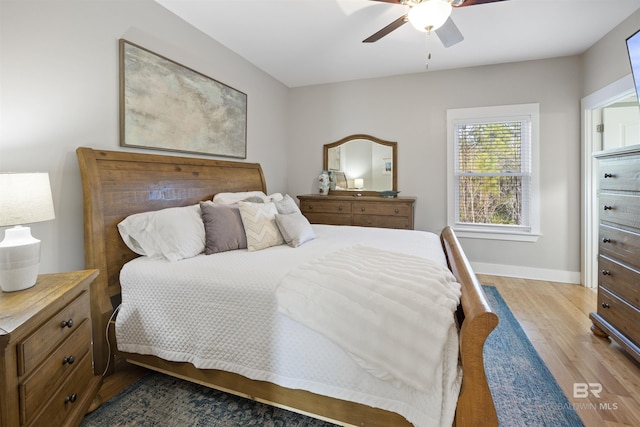 5781 State Highway 180 Unit 6020, Gulf Shores, AL 36542 - bedroom featuring light wood-type flooring and ceiling fan