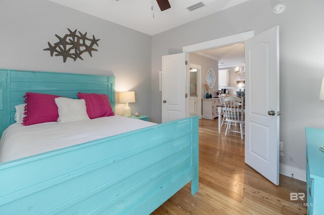 5781 State Highway 180 Unit 6020, Gulf Shores, AL 36542 - bedroom featuring hardwood / wood-style floors and ceiling fan