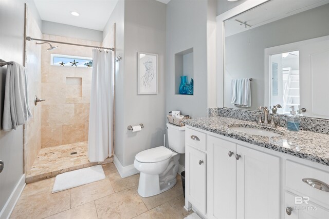 5781 State Highway 180 Unit 6020, Gulf Shores, AL 36542 - bathroom with vanity, tile patterned floors, toilet, and a shower with shower curtain