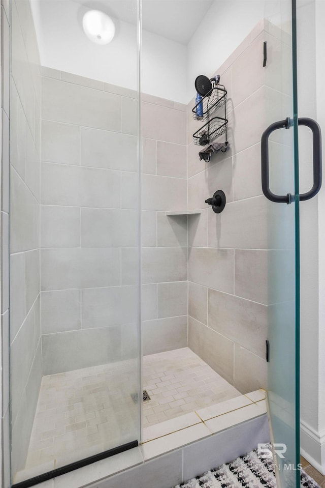 bathroom featuring walk in shower