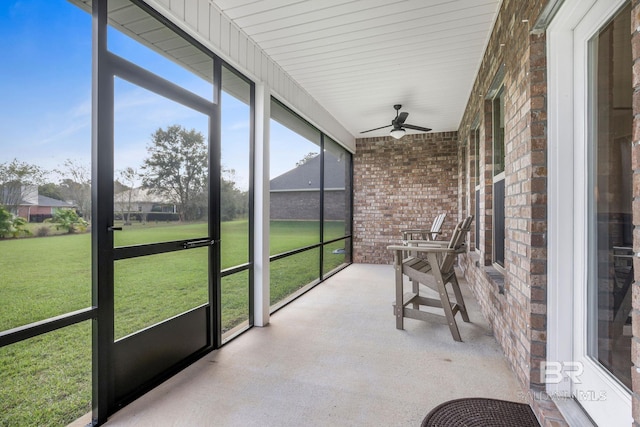 sunroom / solarium with ceiling fan