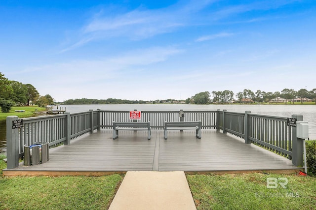 dock area featuring a deck with water view