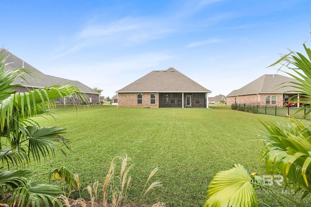 view of yard featuring a sunroom