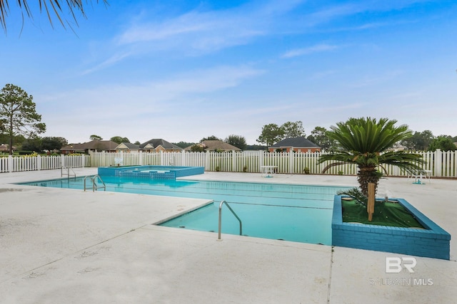 view of pool with a patio