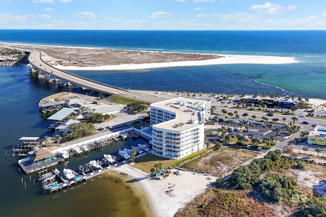 aerial view featuring a water view and a beach view