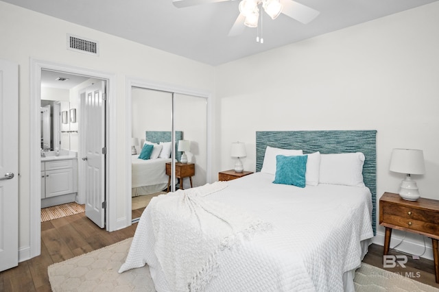 bedroom featuring a closet, ceiling fan, and dark wood-type flooring