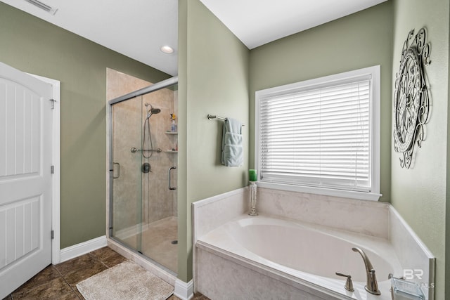 bathroom featuring tile patterned floors and plus walk in shower