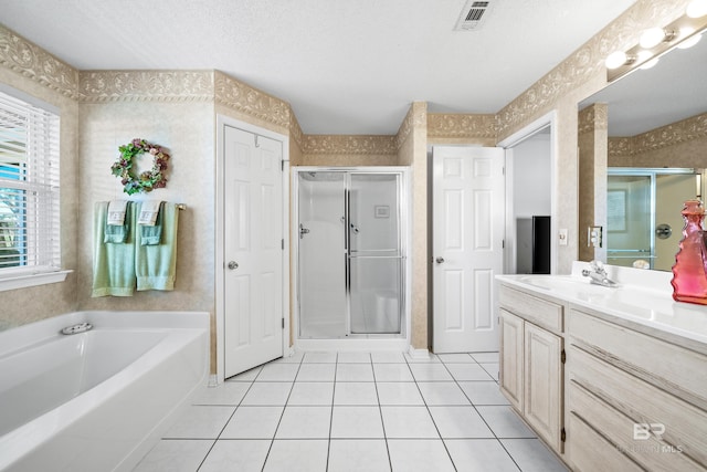 bathroom featuring tile patterned floors, visible vents, vanity, and wallpapered walls