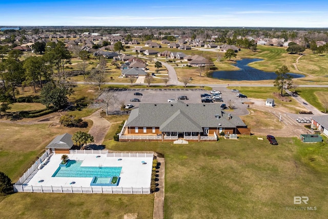 birds eye view of property with a residential view