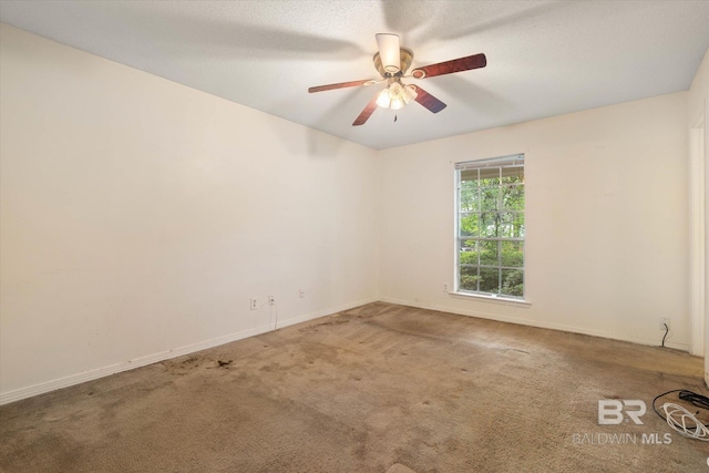 2405 Pavan Dr, Mobile, AL 36693 - carpeted empty room with a ceiling fan and baseboards