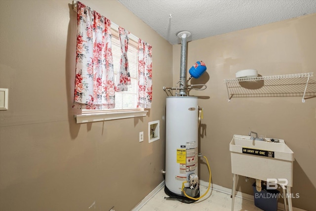 2405 Pavan Dr, Mobile, AL 36693 - utility room featuring gas water heater and a sink