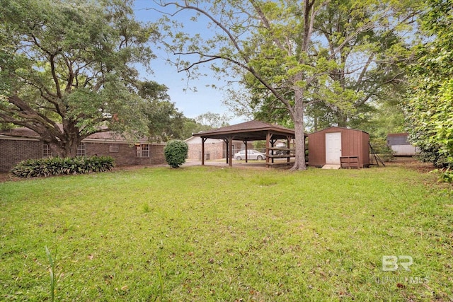 2405 Pavan Dr, Mobile, AL 36693 - view of yard with an outbuilding, a storage shed, and a gazebo