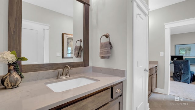 bathroom featuring vanity and tile patterned flooring