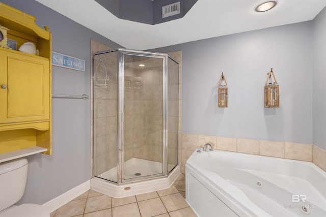 bathroom featuring toilet, tile patterned floors, and plus walk in shower