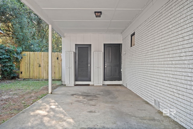 entrance to property with a patio