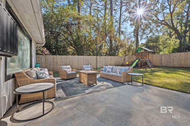 view of patio with outdoor lounge area and a playground