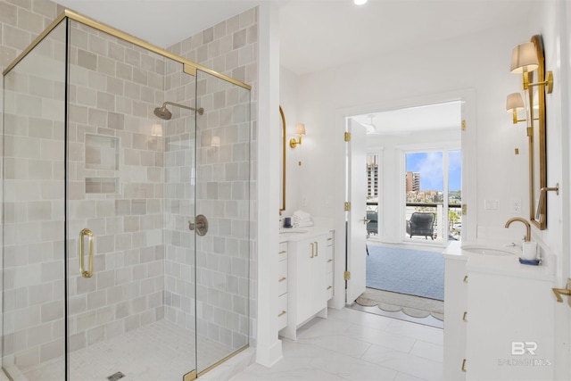 bathroom featuring vanity and a stall shower
