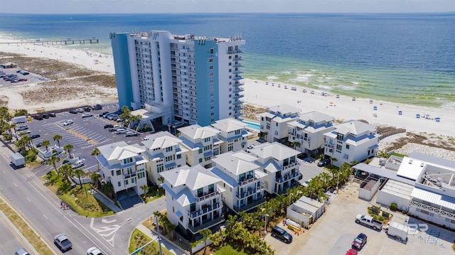 drone / aerial view with a view of the beach and a water view