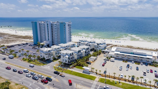 aerial view with a view of the beach and a water view