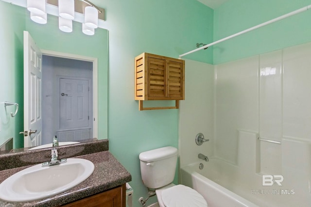 full bathroom with vanity, toilet, and washtub / shower combination