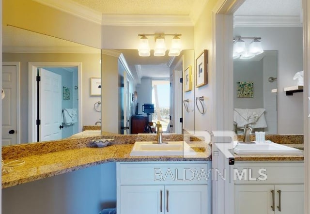 527C Beach Club Trl Unit C-0104, Gulf Shores, AL 36542 - ensuite bathroom featuring vanity and crown molding