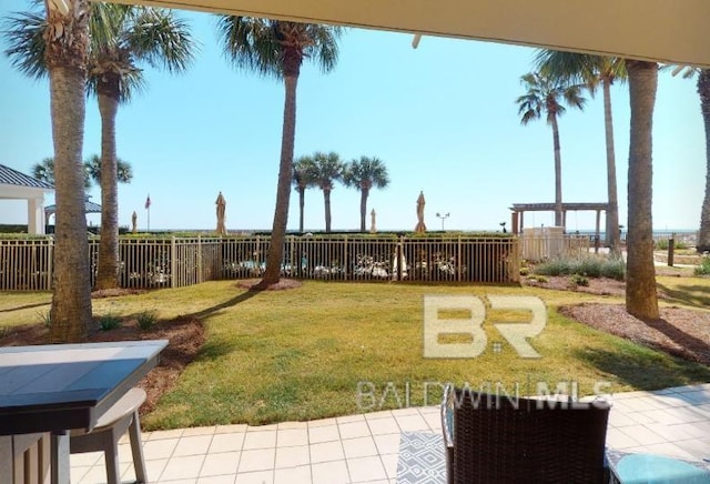 527C Beach Club Trl Unit C-0104, Gulf Shores, AL 36542 - fenced backyard with a patio area